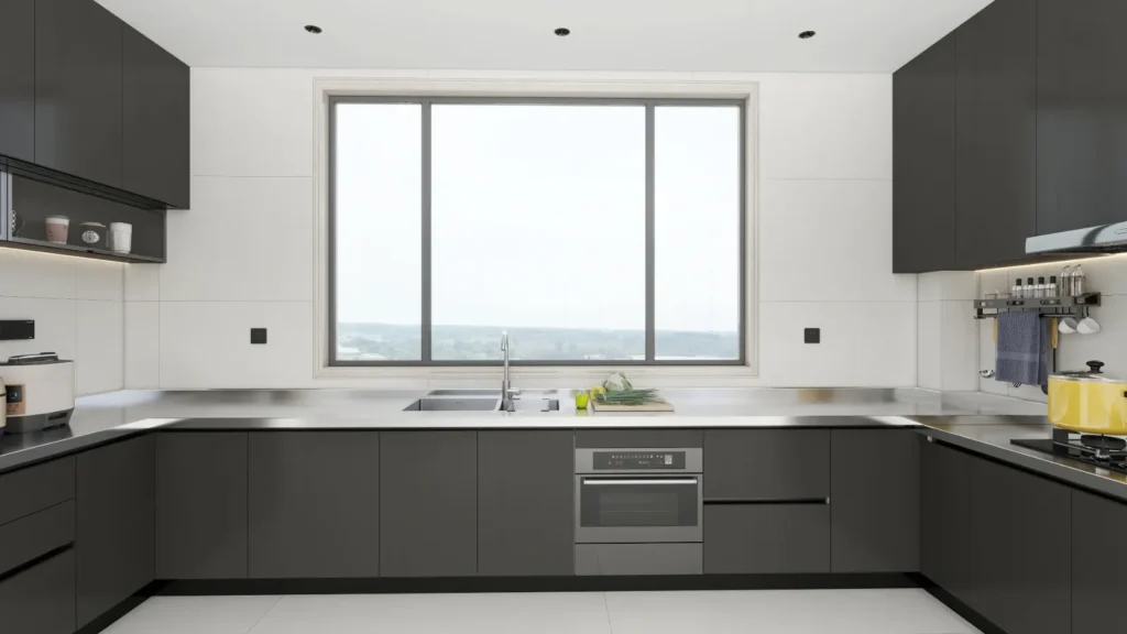 Front elevation of U-shaped kitchen with dark matte cabinets, wide window and stainless steel tops