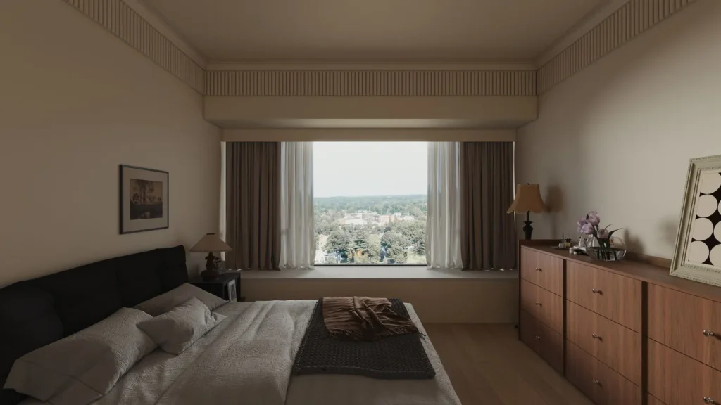 Primary bedroom window seat with panoramic view and soft neutral palette